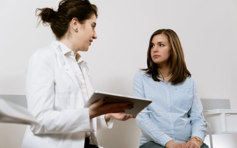 Physiotherapist providing arthritis joint care treatment
